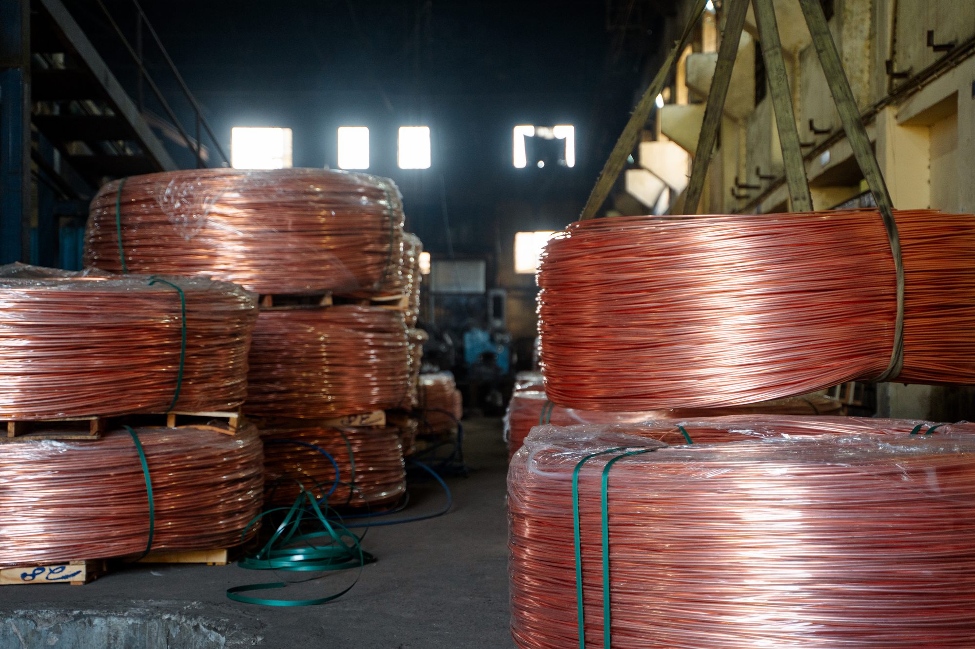 Coils of finished copper wire in a warehouse